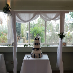 arch decor for wedding cake display