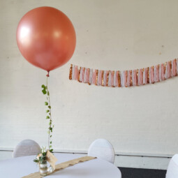 giant rose gold balloon wedding centerpiece