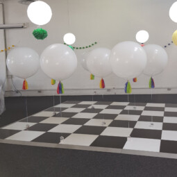 white balloon decor for wedding venue