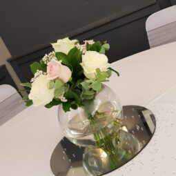 Bowl vase centrepiece with roses and greenery
