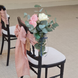 wedding chair with floral posie