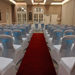 wedding ceremony room with baby blue organza chair sashes