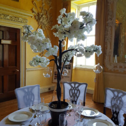 white blossom tree centrepiece with hanging glass baubles